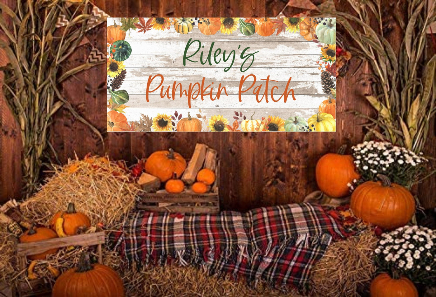 A wooden sign with a white background and a fall theme. The sign has a border of sunflowers, pumpkins, and fall leaves. The text on the sign reads &#39;Riley&#39;s Pumpkin Patch&#39;.