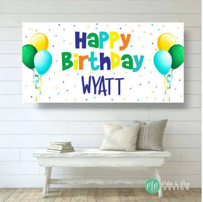 generic happy birthday banner for boys with balloons in blue, green, yellow and orange with polka dots