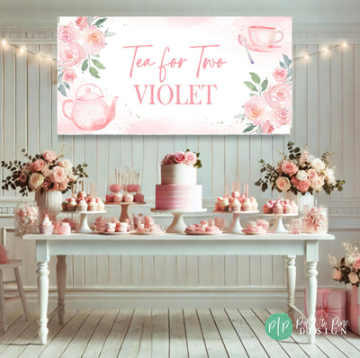 pink feminine tea party birthday banner set in front of a pink and white dessert table