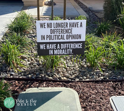 Protect democracy human rights yard sign in black and white with wording we no longer have a difference in political opinion we have a difference in morality