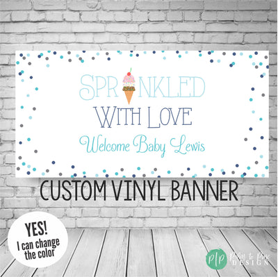 sprinkled with love baby shower welcome banner for baby boy with an ice cream cone and blue dots sprinkled around the border