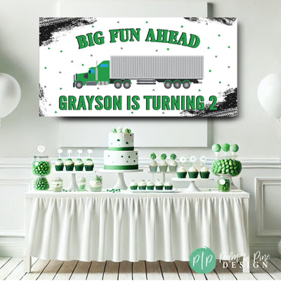 green and white semi truck birthday banner in front of dessert table