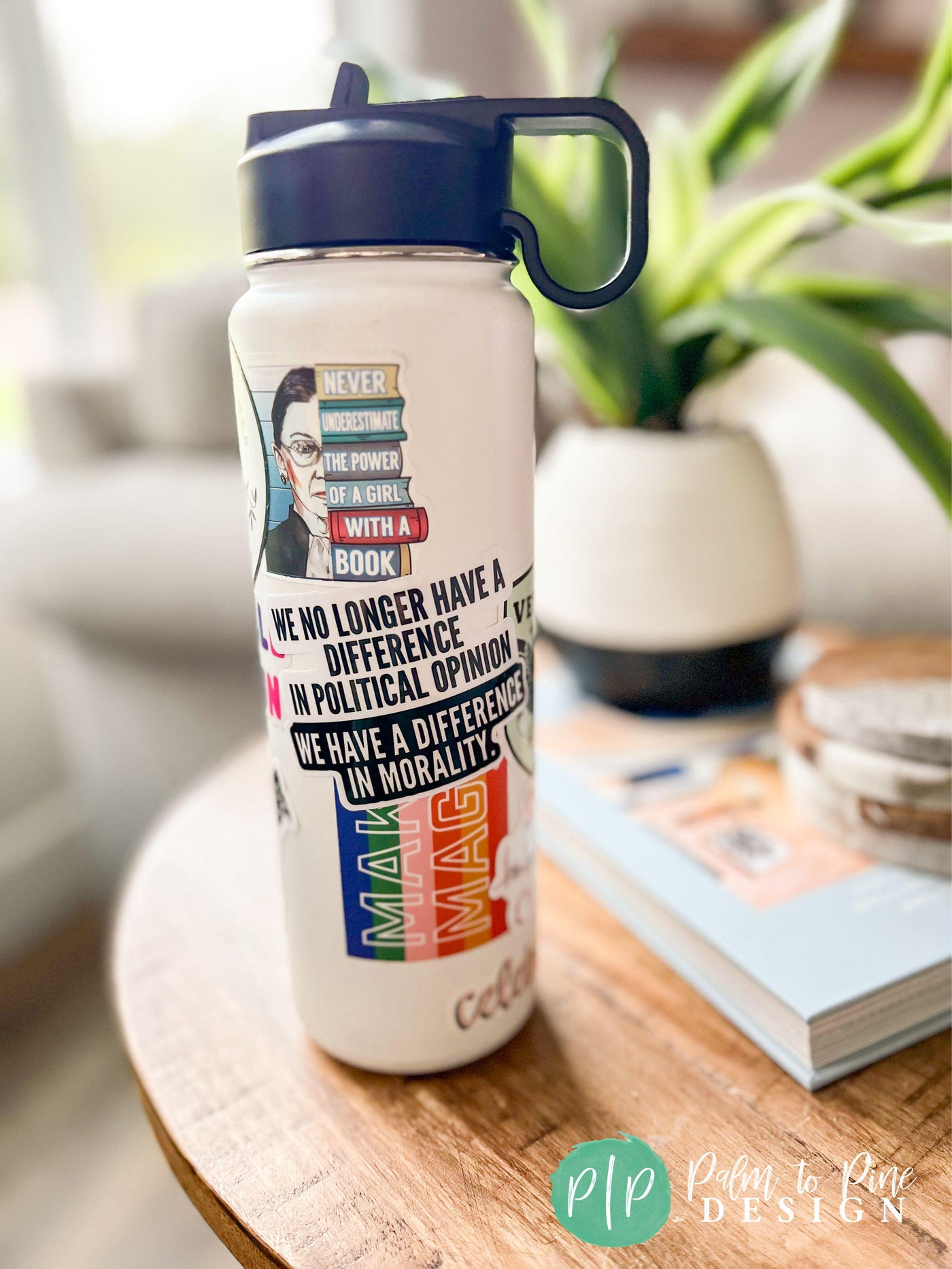 water bottle decorated with political statement stickers supporting RBG, LGBTQA+, human rights and political morality