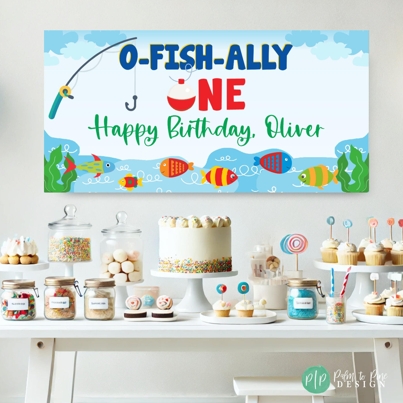 Big One fishing themed banner in front of dessert table with colorful display