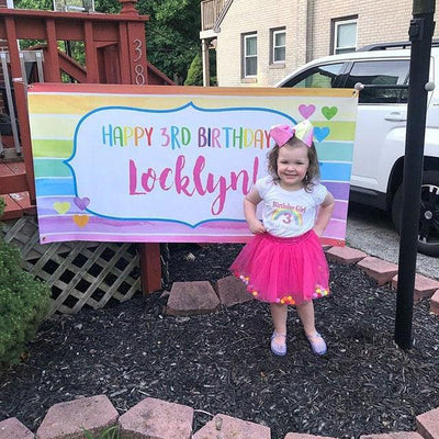 Watercolor paint party birthday banner with pastel rainbow brush strokes and paintbrushes, personalized with name and age.