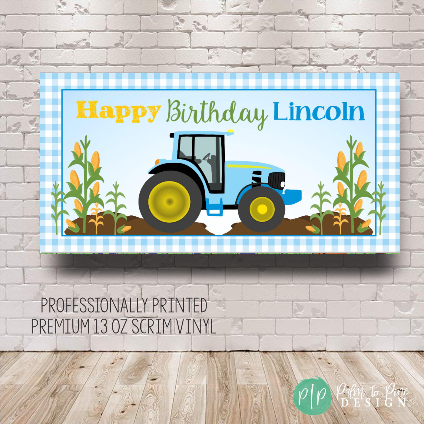 Farm-themed birthday banner featuring a blue tractor, blue gingham check border, and wheat stalks with personalized Happy Birthday Name text