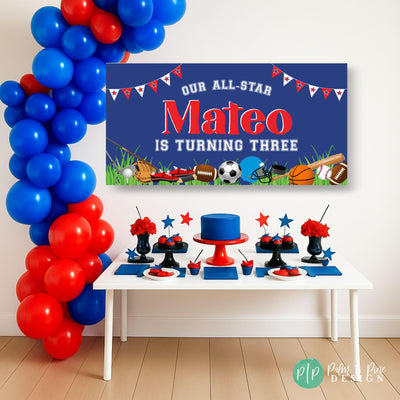 Red, white, and blue All-Star sports birthday banner featuring baseball, basketball, football, soccer, and more, hanging behind a dessert table with red and blue balloon garland