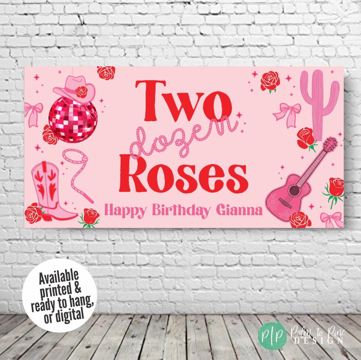 Pink and red Two Dozen Roses party banner featuring cowgirl and rope fonts, disco ball, roses, guitar, cactus, and cowgirl accessories, hung on a plain wall for birthday décor