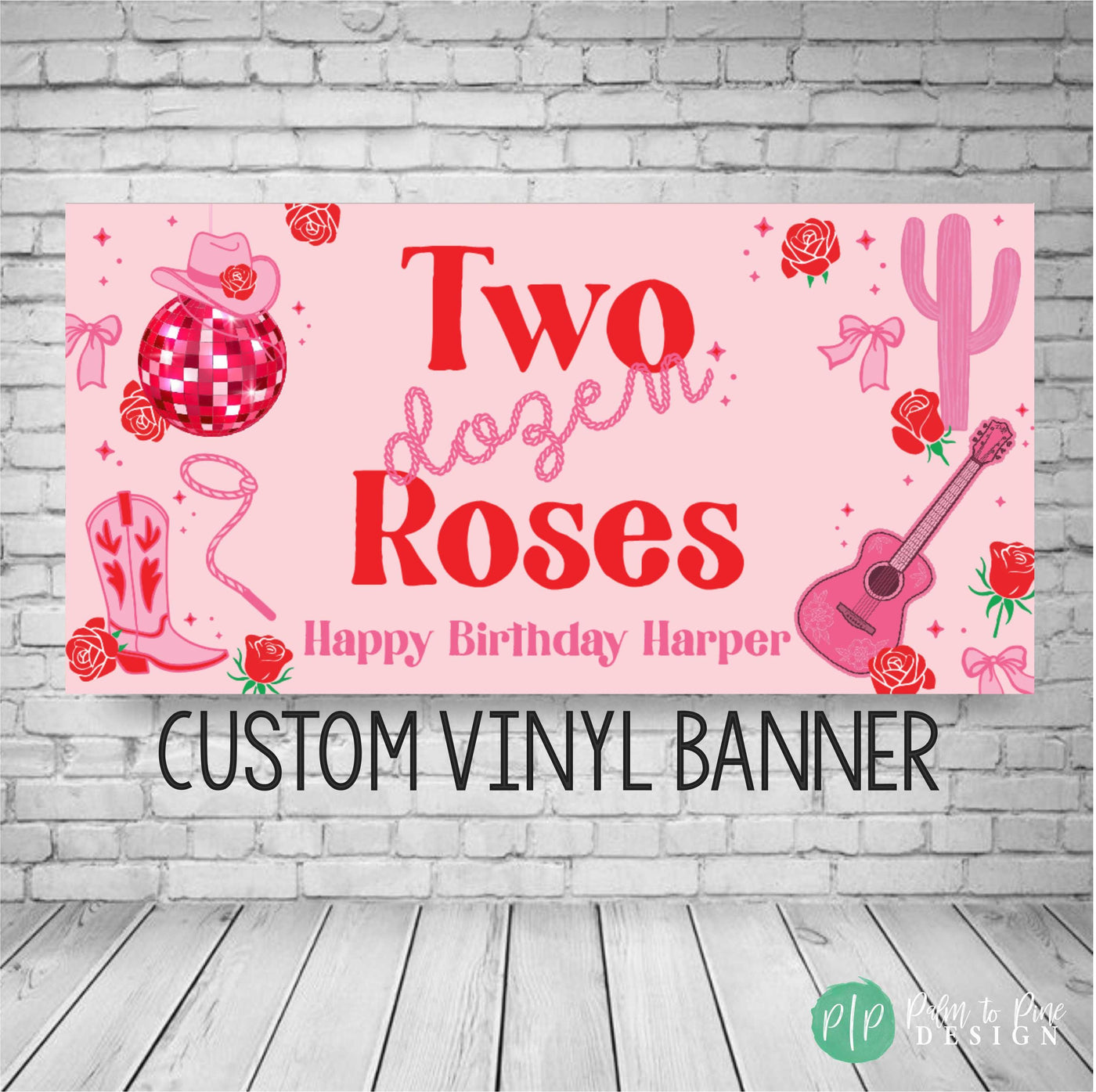 Pink and red girls birthday banner with the wording Two Dozen Roses in a western cowgirl font and rope font for birthday party. Banner has a border of a disco ball, cowgirl hat and boot, cactus, acoustic guitar and roses sprinkled throughout