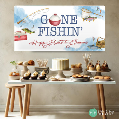Gone Fishing themed birthday featuring a personalized Gone Fishin&#39; birthday banner with watercolor lake scenery and fishing gear illustrations including rod, reel, bobbers, and fish