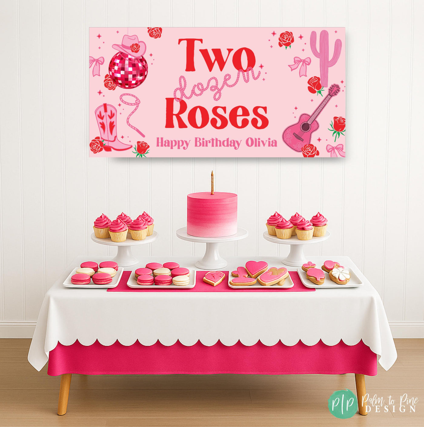 Western-themed Two Dozen Roses birthday banner in pink and red staged above a dessert table with birthday treats, accented by cowgirl and rope lettering and disco ball, cactus, and guitar details