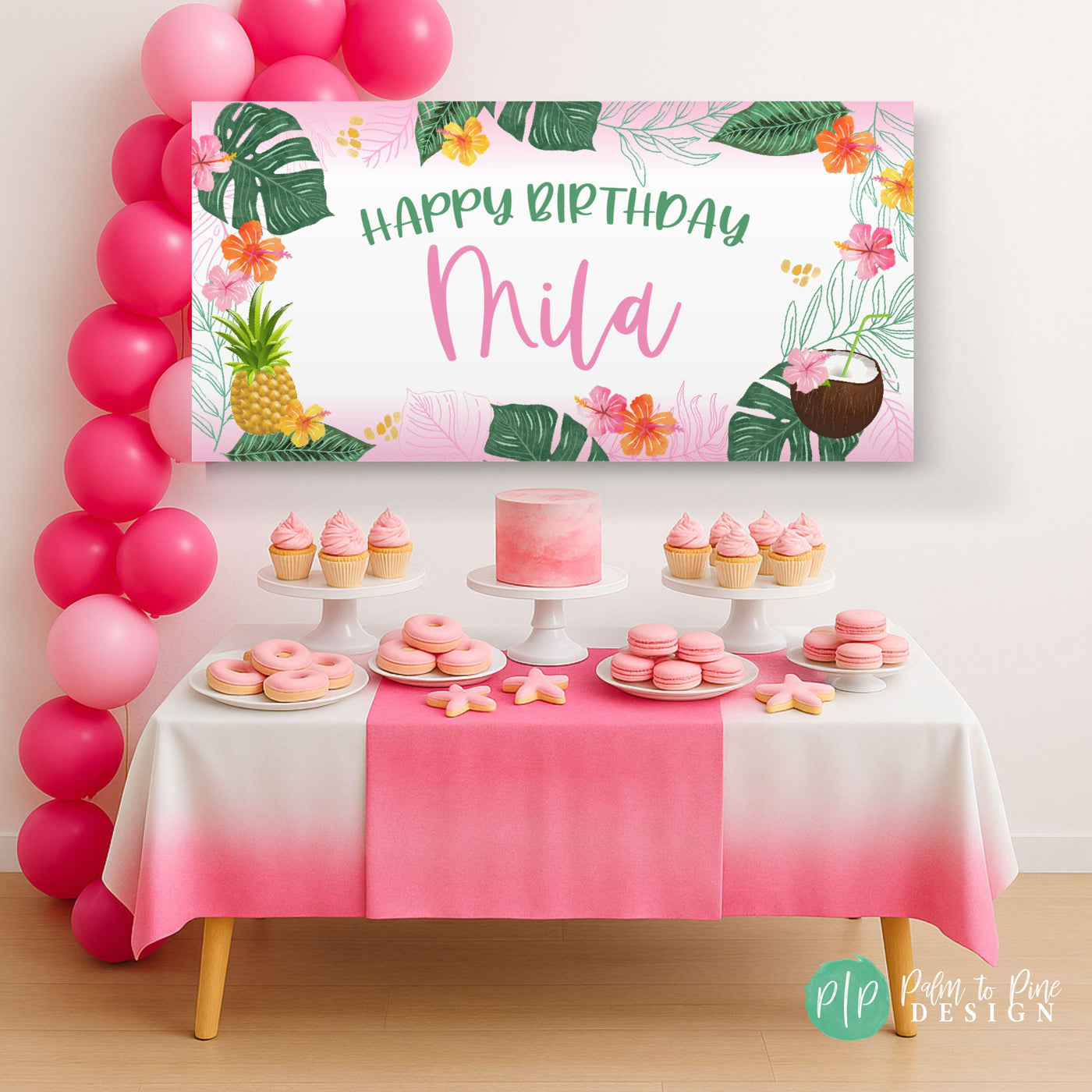 Palm and pineapple backdrop behind a dessert table